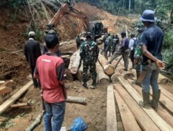 Satgas TMMD ke-126 dan Warga Desa Kute Keramil Bahu Membahu Wujudkan Infrastruktur Desa